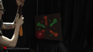 Nicky as a superhero destroys balloons