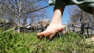 Walking barefoot on the grass and soil and show my dirty tiny feet -footfetish video