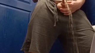Posing and pissing in the gym loo
