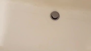 Shooting big load into bathtub
