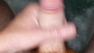 Ginger bear playing with dick in the hot tub
