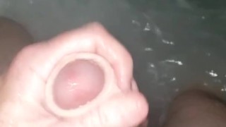 Ginger bear playing with dick in the hot tub