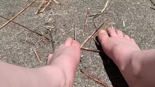 Feet breaking twigs