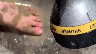 Cleaning my muddy feet with hose