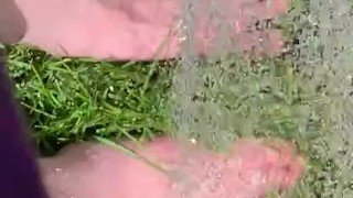Getting feet really wet in the grass