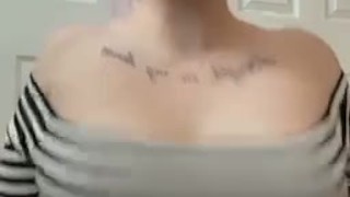 Tattooed alt girl shakes and plays with her boobs