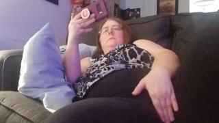 Watching porn on my phone and masturbaiting through my pants