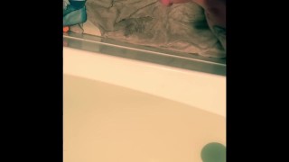 PISSING IN THE BATHTUB AND ON THE FLOOR PEE HUGE DICK DADDY REVAN