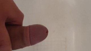 Hot man peeing in the tub with a boner double stream