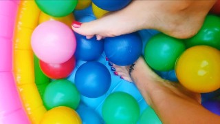 Ball pool feet play