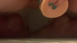 BBW college girl riding a dildo in the shower 