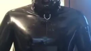Full rubber gimp drools and wanks 