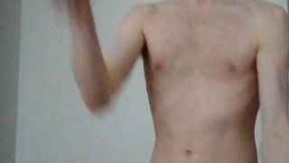 Boy playing Beat Saber while naked and hard