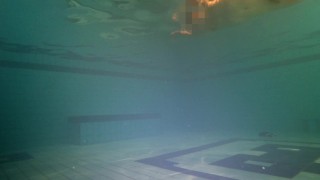Tight ass finds dildo underwater and swims with it
