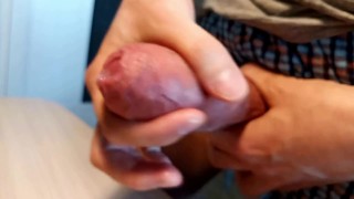 Wet cock head close-up and third orgasm of the day. Testicles full of cum