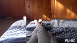 Playing with my feet on the Bed