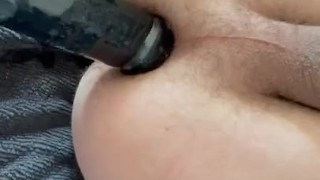 Shoving a 2 inch thick black dildo in my ass…