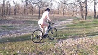 Peeping on a naked girl on a bike