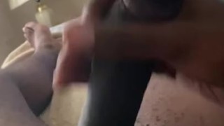Laying Back Stroking Black Dick