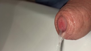 closeup foreskin while peeing