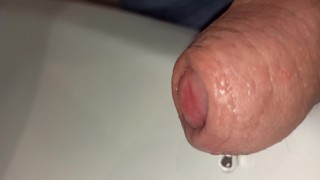 closeup foreskin while peeing