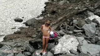 Exhibitionist girl gets naked in snowy wood, sniffing feet and panties  Crazy striptease outdoor