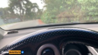 She paid for the ride with a delicious handjob on a public street inside the car