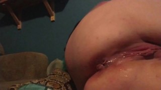 Chubby teen stuffs ice in both holes and plays with herself