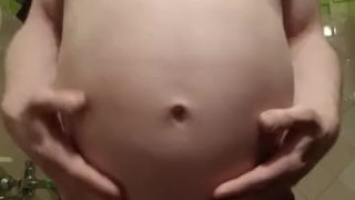 Blowing water from a hose in the shower