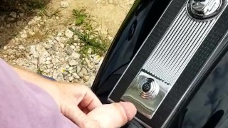 Playing with dick on parked motorcycle 