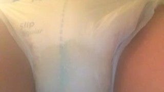 Trans girl soaks her diaper