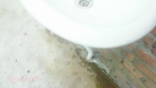 Angel Fowler shocked pissing in the extremely dirty public toilet in a mountain camp