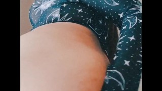 Shy girl plays with herself with window open 