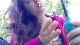 We smoke a cigarette together in a public garden while I show you my big boobs