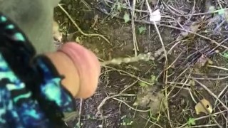 Pissing outdoors wearing a thong
