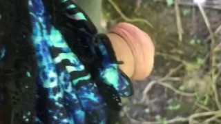 Pissing outdoors wearing a thong