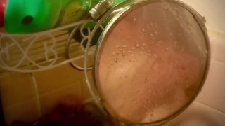 Beautiful tits T-girl pleasuring herself in the shower