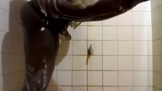 Fat black boy shakes his big ass in shower