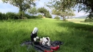Rubber Girl Full in Black Latex Catsuit and Mask Plays with herself Outdoor in a Meadow - Part 3