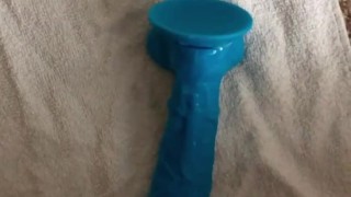 Big cumshot on giant dildo