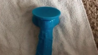 Big cumshot on giant dildo