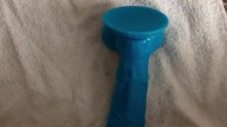 Big cumshot on giant dildo