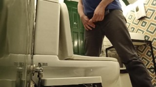 Public toilet pissing, bottom view