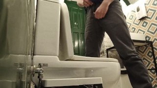 Public toilet pissing, bottom view