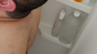 Pounding tub wall until asshole swallows huge butt plug
