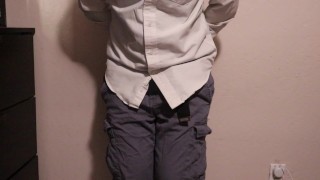 Desperate and handcuffed guy wets his pants