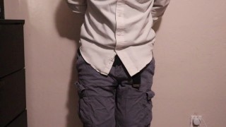 Desperate and handcuffed guy wets his pants