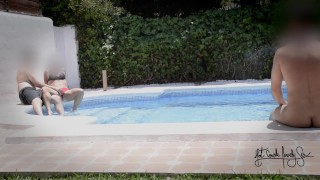 Having fun in a pool of a swinger club!!