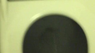 Pissing in the Plane Bathroom