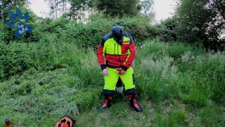 Forest Worker Pup pawing off in gear and boots (outdoors)